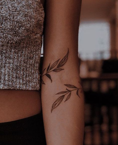 Olive Branch Arm Band Tattoo, Leaf Wrap Around Tattoo Forearm, Arm Plant Tattoos For Women, Arm Crease Tattoo, Simple Feminine Tattoos, Arm Wrap Tattoo, Simple Forearm Tattoos, Around Arm Tattoo, Wrap Around Tattoo