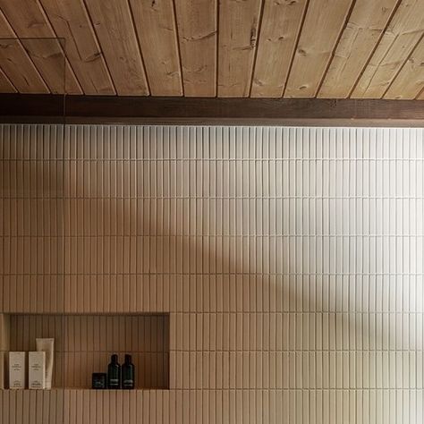 Fireclay Tile on Instagram: "This tranquil #wabisabi bathroom comes courtesy of @honeyedfigs⁠ designer Tamar Barnoon 🛀 Featuring a tub surround of Mosaic #fireclay1x6 Tile in #fireclayMilkyWay framing a window overlooking nature, this warm bathroom is a breath of fresh air after a long day 🌿⁠ ⁠ Tap the link in our bio to bring this look home. ⁠ -⁠ 📷: @laurejoliet⁠ -⁠ #naturalneutrals #neutralstyle #japandi #japandibathroom #minimalism #scandidesign #modernbathroom #fireclaytile #bathroomdesign #bathroomtrends #mosaic #mosaictile #bathroomtransformation #handmadetiles #showerniche #bathinspo #interiordesign #renovation #fireclayshowers #fireclaybathrooms #fireclayniches #fireclaymosaics" Japandi Bathroom Floor, Japandi Bathroom Tiles, Wabisabi Bathroom, Framing A Window, Japan Bathroom, Japandi Bathroom, Warm Bathroom, Japanese Bathroom, Toilet Tiles