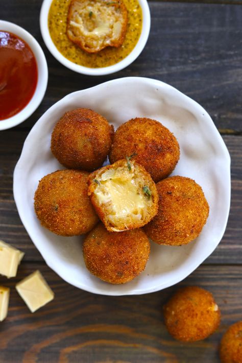 Aerial shot of cheese balls stacked in a white platter. Appetizer Photography, Potato Cheese Balls Recipe, Casserole Pizza, Pizza Appetizer, Cheese Dippers, Small Chops, Potato Cheese Balls, Pizzas Recipe, Vegetarian Snack