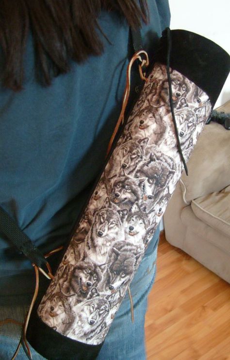 How to make a quiver.  I would suggest leather or faux leather instead of the wolves, but otherwise a great tutorial for Ren Faire! Diy Quiver, Bow And Arrow Quiver Diy, Archery Quiver Pattern, Archery Arm Guard Pattern, Diy Leather Arrow Quiver, Susan Murphy, Diy Archery, Leather Archery Arm Guard, Wolves Howling