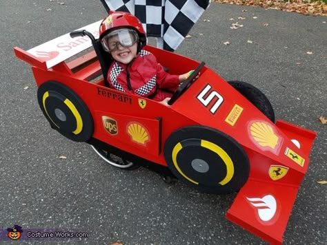 Allyson: Sam is a huge fan of Formula 1 car racing and of Sebastian Vettel, he was lucky enough to meet Sebastian as part of his Make-a-Wish and insisted on being... Wagon Race Car Costume, Cardboard Formula 1 Car, Kindy 500 Cars, Car Halloween Costumes, Diy Car Costume, Race Car Halloween Costume, Formula 1 Costume, Formula 1 Halloween Costume, Kindy 500