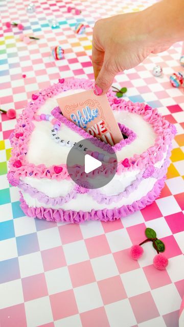 Kara Whitten on Instagram: "How adorbs are these fake cake Valentine boxes?! My daughter and I threw a little valentine’s party in partnership with @evite to make valentine cake boxes complete with friendship bracelets on top! I found the perfect colorful Evite and was able to customize it with a photo of a fake cake heart box so everyone got a glimpse of what we were going to craft. Then we texted it out to friends so we could get those RSVPs in asap to know how many boxes to buy and prep for the party. I definitely recommend pre-icing all of the boxes with the white lightweight spackle the day before so it has time to dry before the party. That way the kids can just decorate with the colored spackle in piping bags and all of the stickers and beads during the party. I can’t wait for the Cake Valentine, Valentine Sweets, Cake Heart, Valentine Boxes, Cake Boxes, Valentine Cake, Fake Cake, Heart Box, January 27