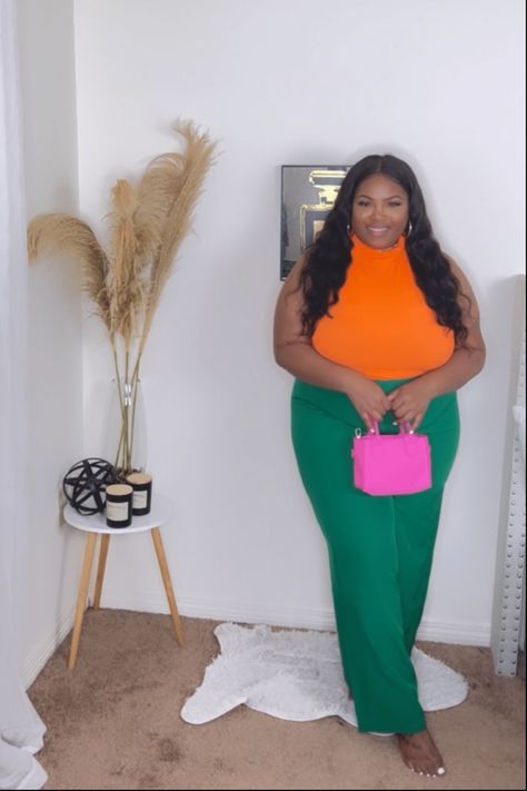 This trendy summer outfit is perfect for a girls night out or date night outfit. Color blocking is definitely in right now, and orange and green pairs perfectly together. Orange top, with green pants. This is definitely good for my plus size and curvy women. Plus Size Green Pants Outfit, Colorblock Outfits Black Women, Orange Plus Size Outfits, Color Blocking Plus Size, Green Color Blocking Outfits, Bright Colored Outfits Plus Size, Plus Size Bright Outfits, Top With Green Pants, Orange Top Outfit Summer