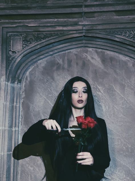 🥀 #morticiaaddams #morticia #halloween #halloweenmakeup #halloweencostumeswomen #hamilton #photooftheday #aesthetic #addamsfamily #roses #model #happy #photography #model #loveyourself #iphone Morticia Addams Photoshoot, Morticia Astethic, Morticia Photoshoot, Morticia And Gomez Photoshoot, Morticia And Gomez Inspired Photoshoot, Morticia Aesthetic, Morticia Addams 1960 Icon, Halloween Room, Happy Photography