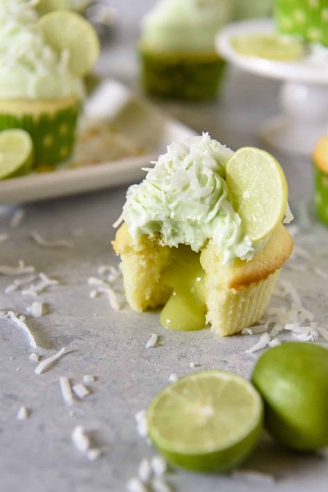 These Coconut Lime Cupcakes are the sweet-tart springtime treats of your dreams, and perfect for lovers of the tropics! Fluffy coconut-infused cupcakes are stuffed with tangy key lime curd, then topped with a crown of lime cream cheese buttercream and a sprinkle of flaked coconut. Key Lime Cupcakes, Infused Cupcakes, Lime Curd, Lime Cupcakes, Template Blogger, Lime Cream, Coconut Cupcakes, Coconut Desserts, Unsweetened Coconut Milk