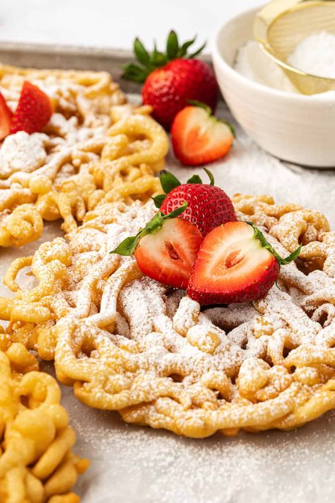 I've spent years perfecting my homemade funnel cake recipe. In it, I'll teach you the precise temperature and timing needed for golden, crispy perfection every time, plus all my best tips for cooking evenly on both sides and how to achieve the perfect consistency of your batter. Funnel Cake Batter, Funnel Cake Fries, Cake Batter Recipes, Homemade Funnel Cake, Pancake Mix Recipe, Homemade Whipped Cream Recipe, Funnel Cake Recipe, Cookie Cookbook, Easy Gluten Free Desserts