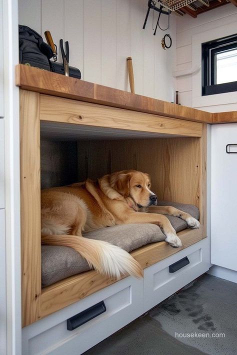 From the start, planners dedicated a section within this garage specifically for puppies. Built In Dog Bed, Dog Nook, Dog Bed Storage, Staircase Storage, Pet Doors, Dog House Diy, Dog Treats Homemade Recipes, Dog Crate Furniture, Dog Wash