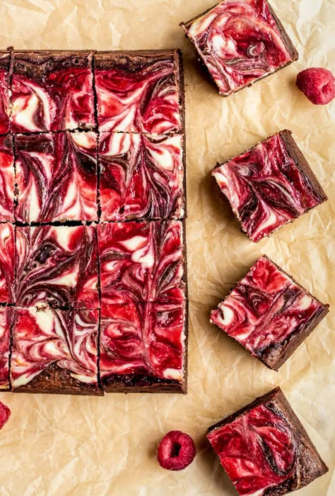 These raspberry cheesecake brownies are decadent, fudgy, creamy and fruity, all in one bite. Homemade raspberry jam and creamy, tangy cheesecake is swirled into rich and fudgy brownies, making these brownies truly irresistible. Raspberry Brownie Recipes, Blackberry Cheesecake Brownies, Summer Brownies, Raspberry Cheesecake Brownies, Boxed Brownie Recipes, Birthday Setup, Raspberry Swirl Cheesecake, Cheesecake Brownies Recipe, Raspberry Brownies