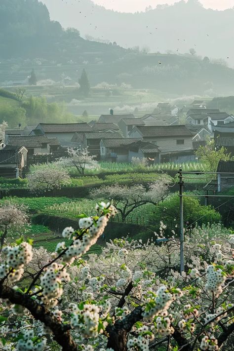 The image shows a beautiful landscape of a rural village in China. The village is surrounded by lush green mountains and terraced fields ->> more details in ai-img-gen.com Rural Chinese Village, China Village, Rural China, Chinese Village, Chinese Mountains, China Country, Rural Village, Green Mountains, Peach Trees