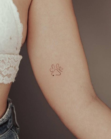 Minimalistic dog paw tattoo located on the inner arm. Paw Print Tattoos, Small Dog Tattoos, Inner Arm Tattoos, Dog Tattoo Ideas, Tattoos For Dog Lovers, Pawprint Tattoo, Dog Paw Tattoo, Small Pretty Tattoos, Paw Tattoo