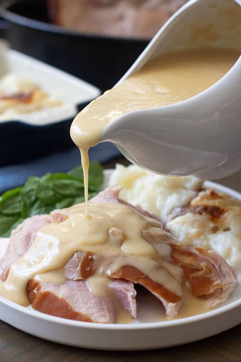 How to Make Ham Gravy - COOKtheSTORY Ham Gravy From Drippings, Pre Cooked Ham Recipes, Cooked Ham Recipes, Drippings Gravy, Gravy From Drippings, Christmas Gravy, Recipes With Cooked Ham, Easy Homemade Gravy, Ham Steak Recipes