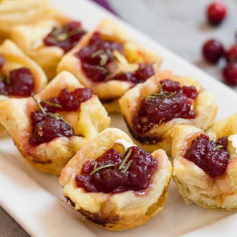 There's a reason why this recipe is duplicated over and over, it's just that good! Cranberry Brie Bites are a quick and easy appetizer recipe that looks like you spent all day. It's mature flavors will waken your tastebuds and you will go back for more. But don't take my word for it. Make it and take it to your next party, don't go empty handed. Cranberry Brie Bites will be devoured. #easyrecipe #easyappetizer #cranberry #cranberrybrie #recipes #recipe #food #Foodie #feedfeed #instagood Nye Apps, Brie Appetizers, Eat Appetizers, Cranberry Appetizer, Raclette Originale, Galette Des Rois Recipe, Cranberry Brie Bites, Cranberry Bites, Goblin Market