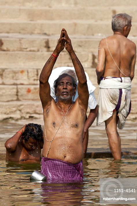 Indian Hindu man bathing and praying in the River Ganges by Kshameshwar Ghat in holy city of Varanasi, India Indian People, Indian Heritage, Nature Wildlife, Holy Water, I Can Change, A Day In Life, Artist Profile, Varanasi, The River