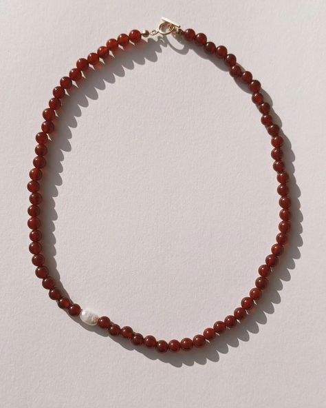 Lakshmi ❤️ Ruby red carnelian and one freshwater pearl ~ part of the asymmetric drop <3 #carnelian #beadedjewellery #beadnecklace #handmadejewellery Red Beaded Necklaces, Beads Making, Tan Leather Belt, Hindu Goddess, Red Carnelian, The Hindu, Vibrant Energy, Handcrafted Accessories, Bead Work Jewelry