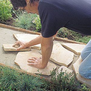 Step-by-step: Flagstone path.  Going to try this weekend or next. Flagstone Path, Flower Tower, Flagstone Patio, Garden Walkway, Have Inspiration, Garden Pathway, Backyard Projects, Retaining Wall, Lawn And Garden