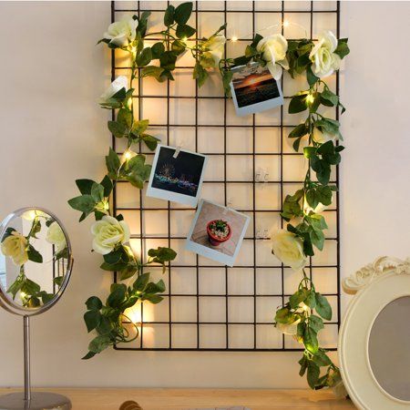 Add a romantic touch to your space with the Urban Shop Rose Vine Garland with Lights and Photo Clips. The Urban Shop Rose Garland Light with Photo Clips makes the perfect decorative accent to light up your bedroom, dorm room, living room or home office. Make your space your own with the photo clip lights! The Urban Shop Garland Light measures 8.5 feet long and includes 10 photo clips so you can hang your precious memories up with this beautiful faux rose vine garland. You can wipe the Urban Shop Indoor Roses, Garland With Lights, Vine Garland, Urban Shop, Rose Vine, Work Office Decor, Clip Lights, Rose Garland, Dorm Room Inspiration