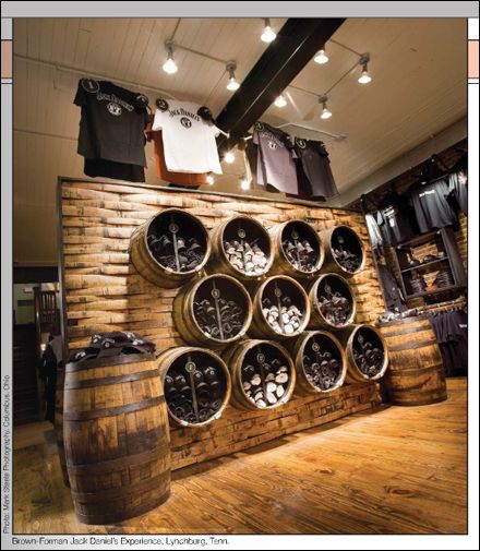 Jack Daniel's Experience Decor Courtesy of FixturesCloseUp and DDI Sept 2012 Rustic Merchandise Display, Rustic Tshirt Display, Retail Shirt Display Ideas, Tshirt Retail Display, Tshirt Displays Retail, Retail Display Fixtures, Rustic Retail Display, Diy Shirt Display, T Shirt Shop Display Ideas