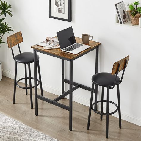 PRICES MAY VARY. [3 Pieces Pub Bistro Table Set] ----- 1- piece square coffee table and 2-piece round barstools. Both the table and chairs are made of sturdy iron frame and high quality particle board (0.6 inch thick) for a chic look. Metal frame of table and stools enhance its design. Carrying capacity: table: 300LBS. Stool: 350LBS. [Space Saving Kitchen Table Set] ----- The stools can be moved under the table when not in use, it is a nice solution for small spaces, such as limited kitchen, stu Small Space Bar, Space Saving Kitchen Table, Square Dining Table Set, Bar Table And Chairs, Bistro Table Set, High Top Tables, Table Bistrot, Bar Table Sets, Solid Wood Dining Set