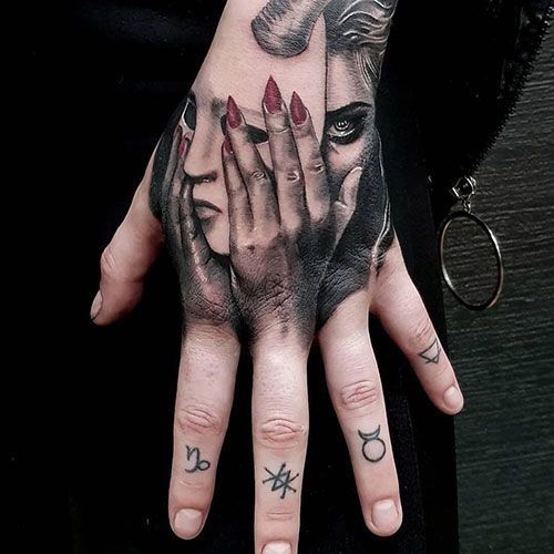 25 Coolest Hand Tattoos for Women and Men  FamilyMinded