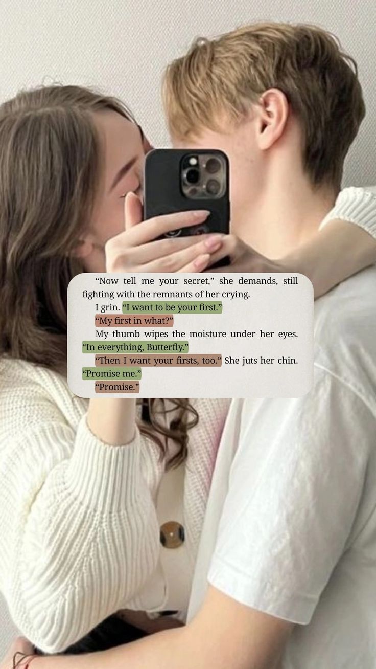 a man and woman taking a selfie in front of a computer screen with the caption