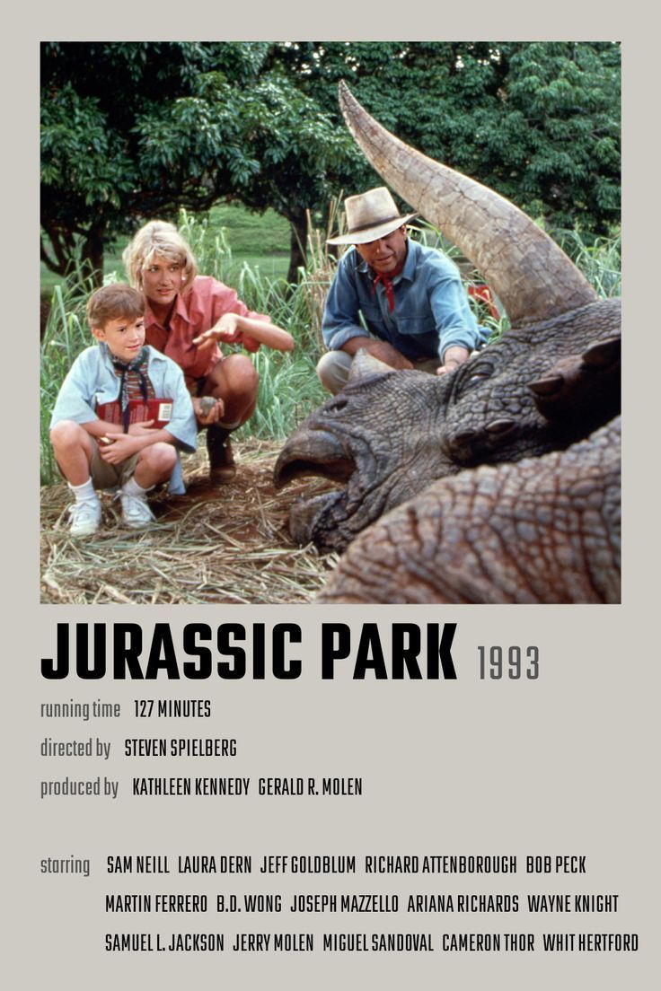 an advertisement for the movie jurassic park, featuring two men and a young boy