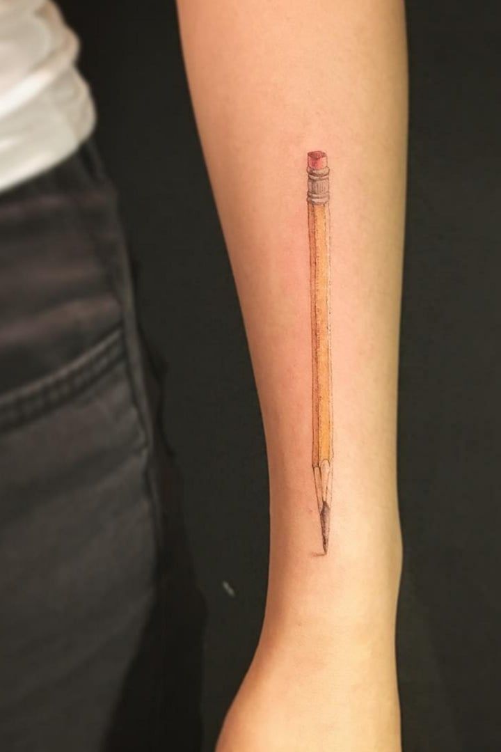 a pencil tattoo on the left arm and right leg, with an eraser in it