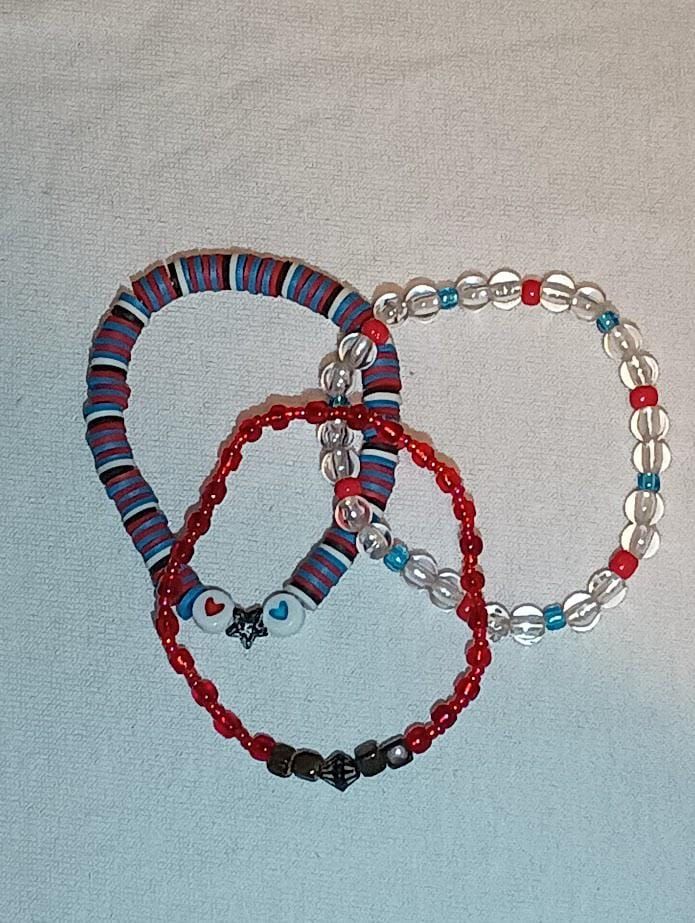 spiderman themed 3pts set stackable beaded bracelets  include :  1 blue, black, red, and white clay beaded with star and hearts  1 red sea bead bracelet  1 clear acrylic with red and blue sea beads bracelet Spider Man Bracelet Beads, Red Bracelet Ideas, Spiderman Bracelet, Verse Bracelet, Sea Beads, Stackable Beaded Bracelets, Bracelet Inspo, Blue Beaded Bracelets, Red Bracelets