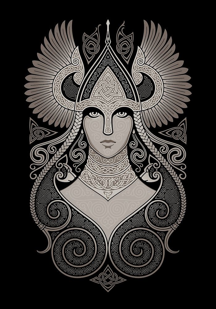 a woman's face with an intricate design on the front and back of her shirt