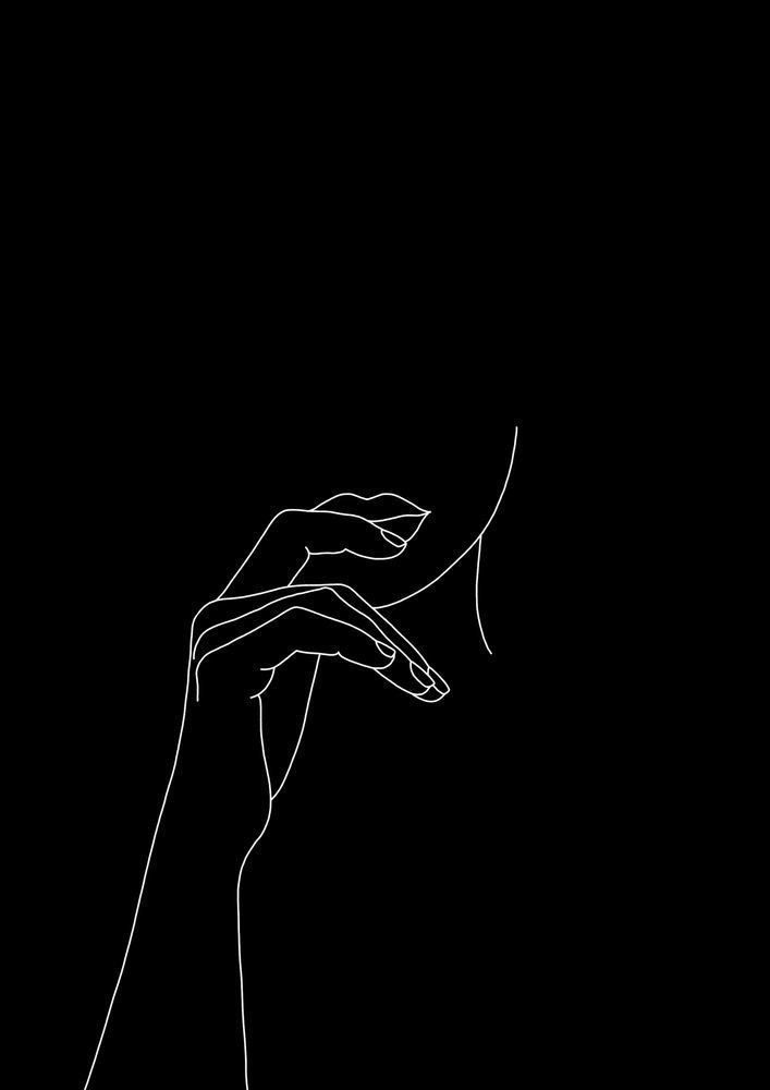 a person's hand holding something in their left hand on a black background with white lines