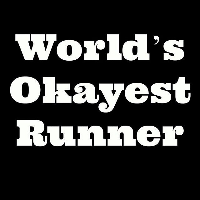 the words world's okayest runner are in white letters on a black background