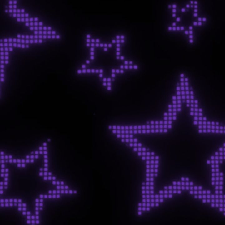 purple and black stars are arranged in the shape of pixelated dots on a dark background