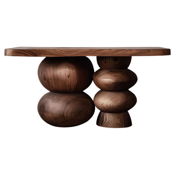 a wooden table with three balls on the top and one ball at the bottom, sitting in front of it