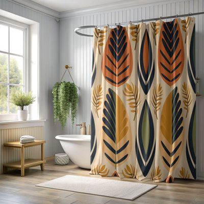 a bathroom with a bathtub, rug and shower curtain