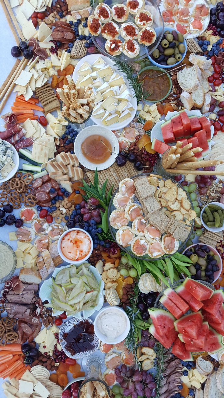 a table filled with lots of different types of food