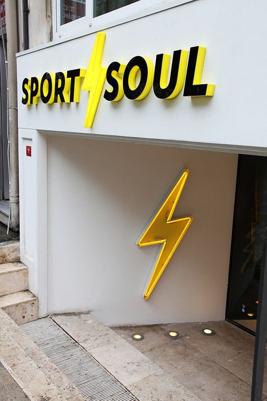 there is a yellow sign that says sport soul