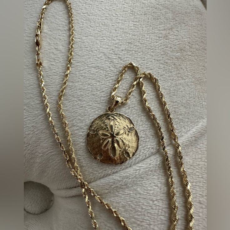 Very Gently Used Michael Anthony Solid 2 Mm Rope Chain 18” With Sand Dollar Pendant Very Gently Used! About 8 Grams Of Gold Between Them Both. Gold-tone Round Chain Necklace With Engraving, Gold-tone Round Engraved Chain Necklace, Gold-plated Rope Chain Jewelry With Round Pendant, 14k Gold Medallion Necklace With Rope Chain, Gold Plated Rope Chain With Round Pendant, Gold Plated Rope Chain Jewelry With Round Pendant, Yellow Gold Pendant Rope Chain Necklace, Yellow Gold Rope Chain Necklace With Pendant, Yellow Gold Pendant Necklace With Rope Chain