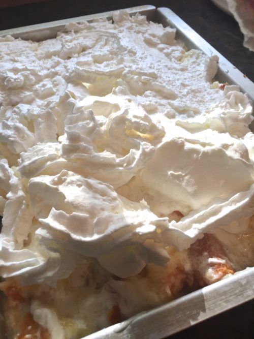 a pan filled with food sitting on top of a table