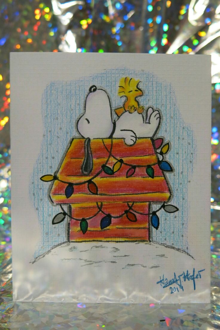 a handmade card with a snoopy christmas scene on it