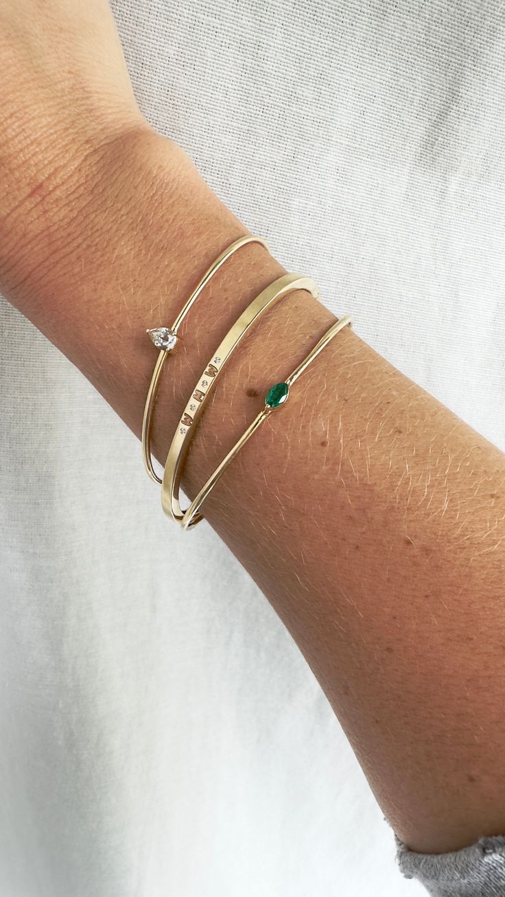 Our Gold Engraved Initial Cuff Bangle is the perfect addition to your every day stack. In between each initial lays a dainty diamond or birthstone of your choice *Choose the number of Initials/Stones you would like. Then add your birthstone choice and initials in the personalization box before checkout *Made to order, please allow 6-8 weeks for delivery. Initials Bracelet, 11 Stone, Engraved Initials, Stone Bangle, Gold Engraving, Initial Bracelet, Unique Bracelets, Baguette Diamond, Cuff Bangles