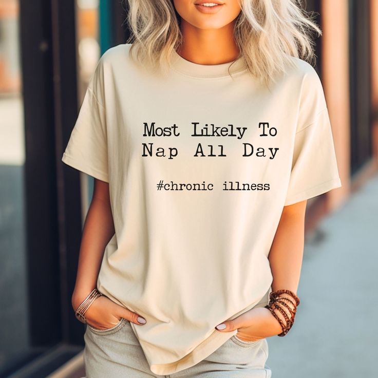 Comfort Colors "Most Likely to Nap All Day" Chronic Illness Shirt This Comfort Colors shirt is a perfect blend of comfort and humor, designed specifically for those who understand the unique challenges of living with a chronic illness. The shirt features the playful phrase "Most Likely to Nap All Day" across the front, making it a relatable and lighthearted addition to your wardrobe. Features: Premium Comfort Colors Fabric: Soft, durable, and garment-dyed for a lived-in feel right from the start. Relaxed Fit: Offers a comfortable, slightly oversized fit that's perfect for everyday wear. High-Quality Print: The "Most Likely to Nap All Day" graphic is printed with care to ensure long-lasting wear and vibrant colors. Sizing Please refer to the size video and size chart in the photo.  Please m Spoon Theory, Comfort Colors Tshirt, Sarcastic Shirts, Invisible Illness, Comfort Colors Shirt, Awareness Shirt, Fade Color, Funny Shirt, Chronic Illness