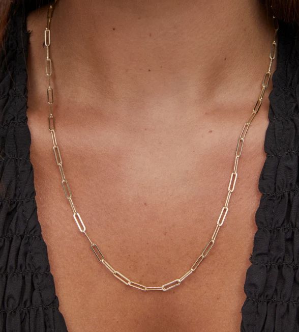 Everyone is looking for the ideal layering chain, and the Courtney Paperclip Necklace in Gold is just that. Its trendy link design complements both delicate necklaces and larger statement pieces perfectly, making chic styling easier than ever. Paperclip Necklace Layering, Map Bag, Tailgate Gear, Paperclip Necklace, Delicate Necklaces, Bath And Body Shop, Link Design, Delicate Necklace, Engraved Rings