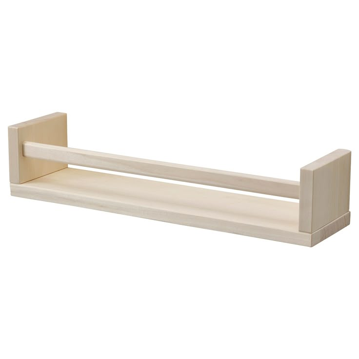 a white wooden shelf with two shelves on each side and one shelf below the shelf