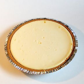 a pie sitting on top of a white table