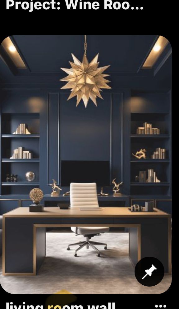 an office with blue walls and gold stars hanging from the ceiling