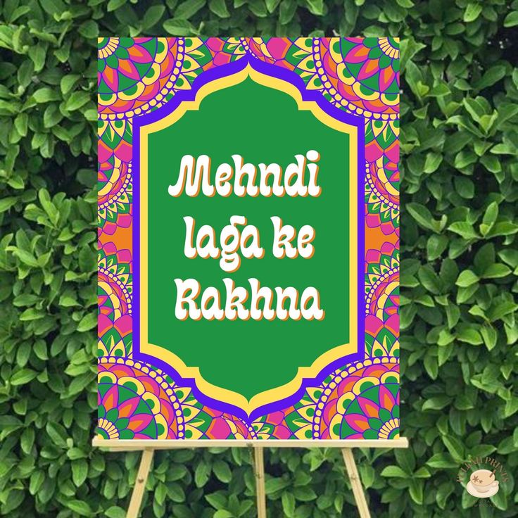 a sign that says mehndi laga ke rahanna on it in front of some bushes