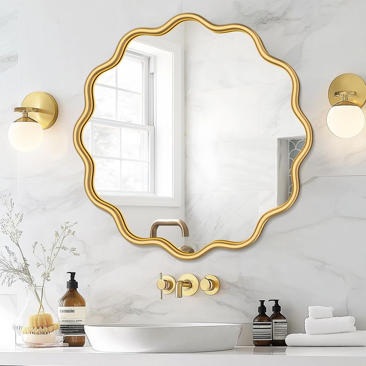 a bathroom with a sink, mirror and soap dispenser on the counter