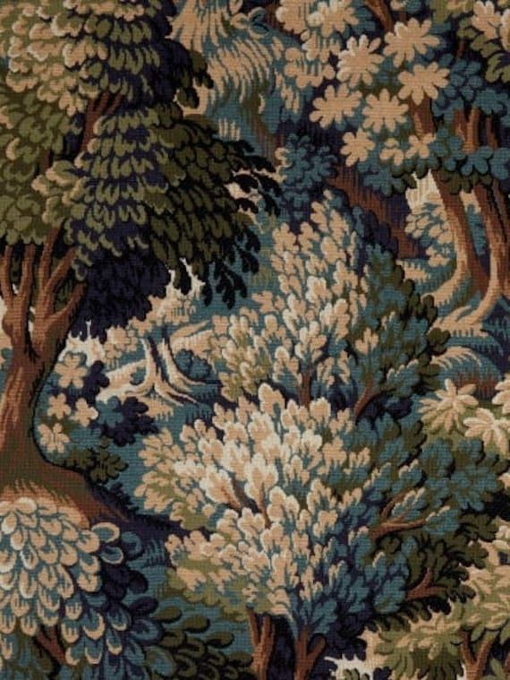 an area rug with trees and flowers on it