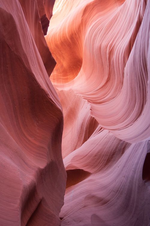 a narrow slot in the side of a canyon