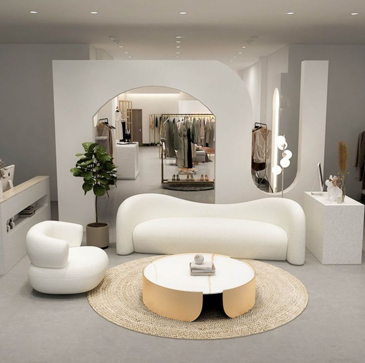 a living room filled with furniture and mirrors