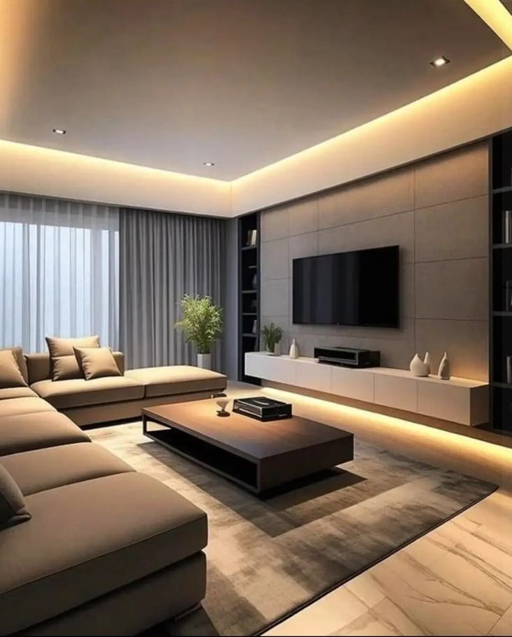 a living room with couches, tables and a television on the wall in it